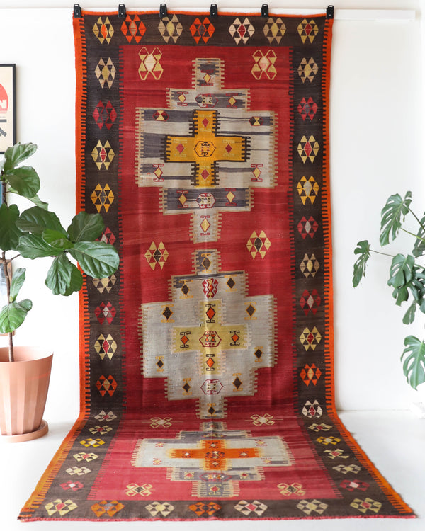 Vintage kilim rug in living room setting, bright colors, wild shaman, soft rug, bold color, Portland, Oregon, rug store, rug shop, local shop, vintage rug, modern kilim, warm colors