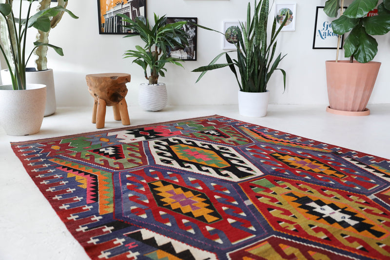 Vintage kilim rug in living room setting, bright colors, wild shaman, soft rug, bold color, Portland, Oregon, rug store, rug shop, local shop, vintage rug, modern kilim, warm colors