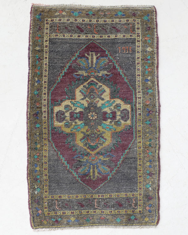 Vintage Turkish mini rug in room decor setting, old rug, antique rug, pastel colors, faded colors, Turkish rug, vintage rug, soft rug, Portland, Oregon, rug store, rug shop, local shop,  bright colors, bold colors