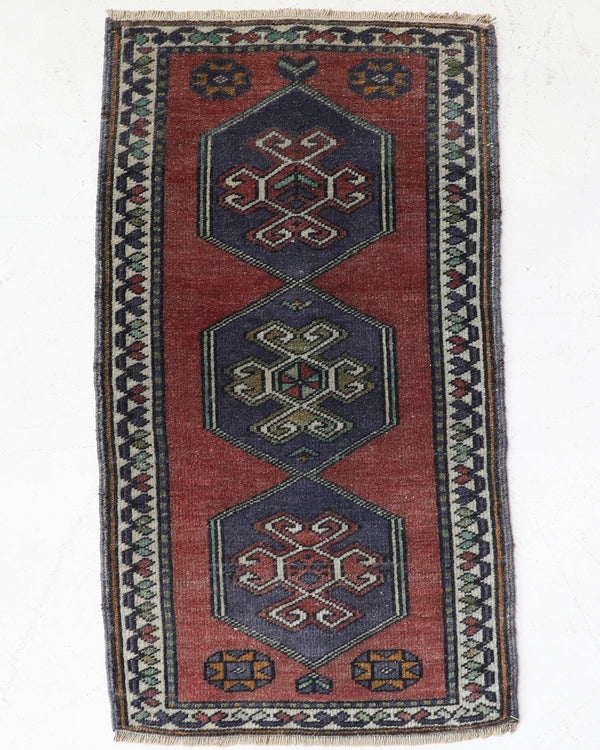 Vintage Turkish mini rug in room decor setting, old rug, antique rug, pastel colors, faded colors, Turkish rug, vintage rug, soft rug, Portland, Oregon, rug store, rug shop, local shop,  bright colors, bold colors