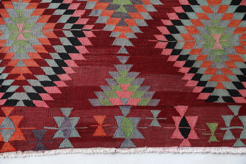  Vintage kilim rug in living room setting, old rug, antique rug, pastel colors, faded colors, Turkish rug, vintage rug, soft rug, Portland, Oregon, rug store, rug shop, local shop, earthy tones, earthy colors, warm colors