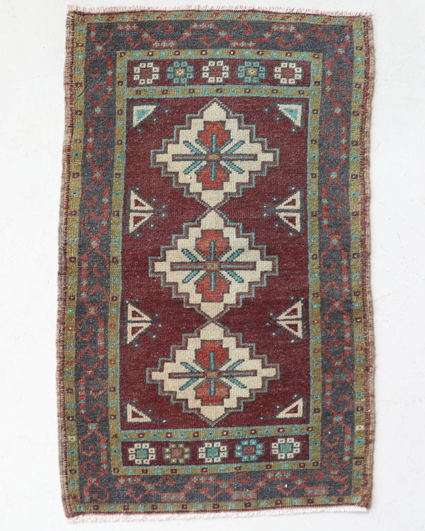 Vintage Turkish mini rug in room decor setting, old rug, antique rug, pastel colors, faded colors, Turkish rug, vintage rug, soft rug, Portland, Oregon, rug store, rug shop, local shop,  bright colors, bold colors