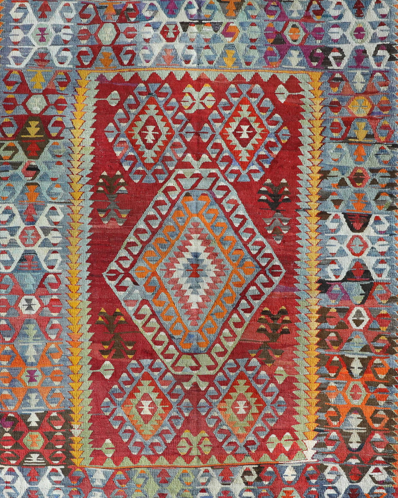 Vintage kilim rug in room decor setting, old rug, antique rug, pastel colors, faded colors, Turkish rug, vintage rug, soft rug, Portland, Oregon, rug store, rug shop, local shop, bold colors, bright colors, faded colors