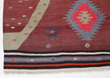 Vintage Turkish rug in a living room setting, pile rug, Turkish rug, vintage rug, portland, rug shop, bright colors, wild shaman, soft rug, bold color, Portland, Oregon, rug store, rug shop, local shop, antique rug