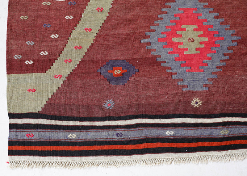 Vintage Turkish rug in a living room setting, pile rug, Turkish rug, vintage rug, portland, rug shop, bright colors, wild shaman, soft rug, bold color, Portland, Oregon, rug store, rug shop, local shop, antique rug