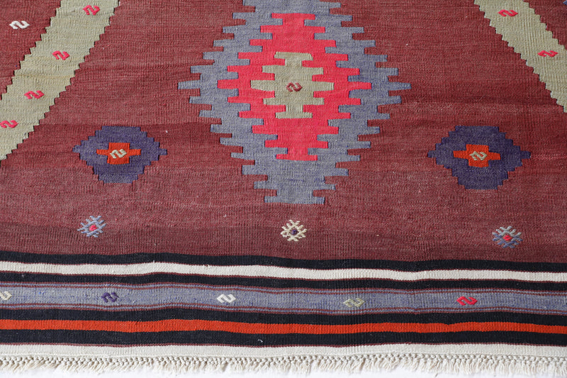 Vintage Turkish rug in a living room setting, pile rug, Turkish rug, vintage rug, portland, rug shop, bright colors, wild shaman, soft rug, bold color, Portland, Oregon, rug store, rug shop, local shop, antique rug