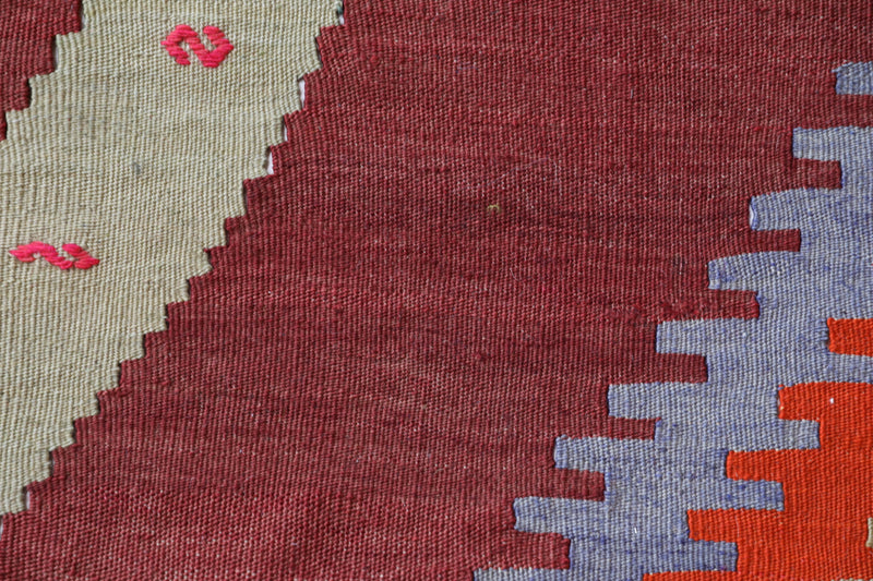Vintage Turkish rug in a living room setting, pile rug, Turkish rug, vintage rug, portland, rug shop, bright colors, wild shaman, soft rug, bold color, Portland, Oregon, rug store, rug shop, local shop, antique rug