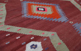 Vintage Turkish rug in a living room setting, pile rug, Turkish rug, vintage rug, portland, rug shop, bright colors, wild shaman, soft rug, bold color, Portland, Oregon, rug store, rug shop, local shop, antique rug