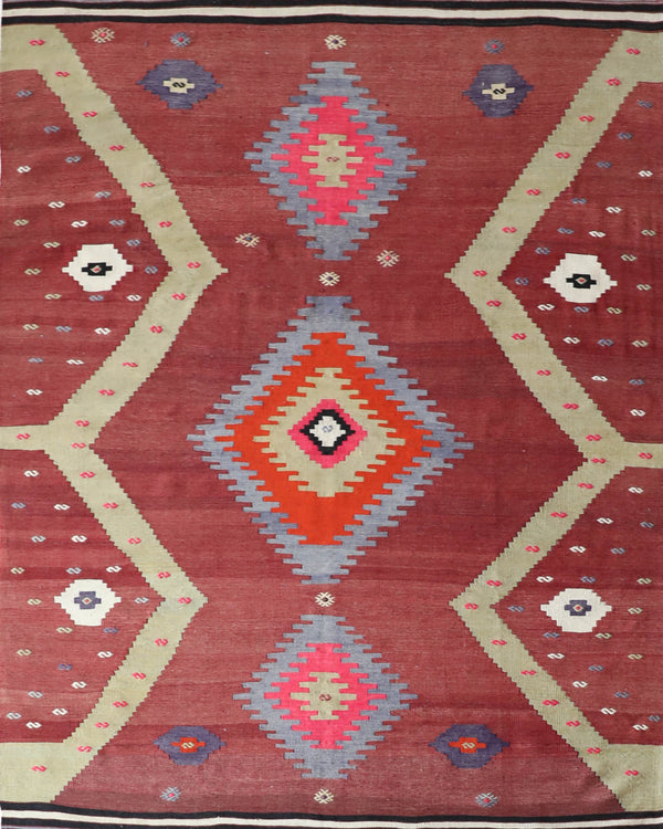 Vintage Turkish rug in a living room setting, pile rug, Turkish rug, vintage rug, portland, rug shop, bright colors, wild shaman, soft rug, bold color, Portland, Oregon, rug store, rug shop, local shop, antique rug