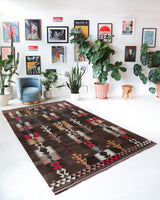 Vintage kilim rug in living room setting, bright colors, wild shaman, soft rug, bold color, Portland, Oregon, rug store, rug shop, local shop, vintage rug, modern kilim, warm colors