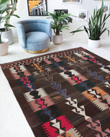 Vintage kilim rug in living room setting, bright colors, wild shaman, soft rug, bold color, Portland, Oregon, rug store, rug shop, local shop, vintage rug, modern kilim, warm colors