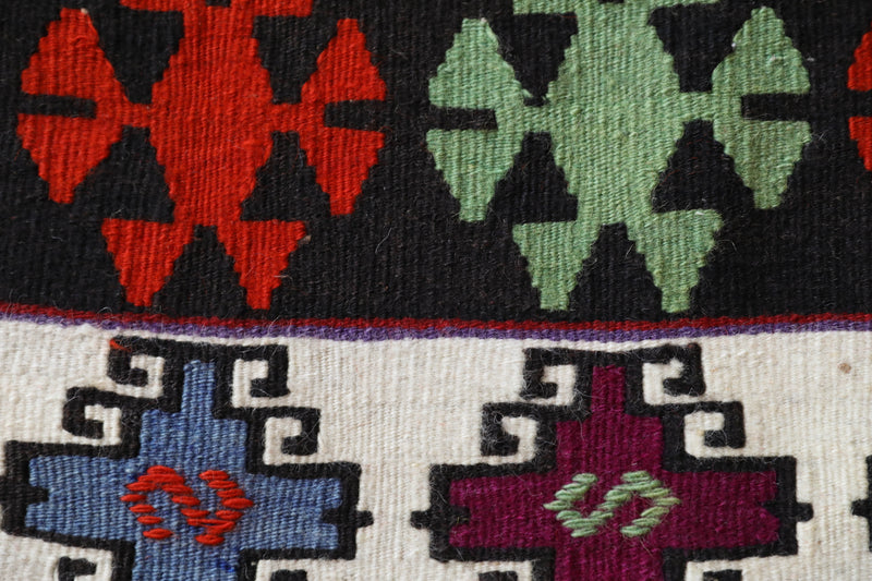 Vintage kilim rug in living room setting, bright colors, wild shaman, soft rug, bold color, Portland, Oregon, rug store, rug shop, local shop, vintage rug, modern kilim, warm colors
