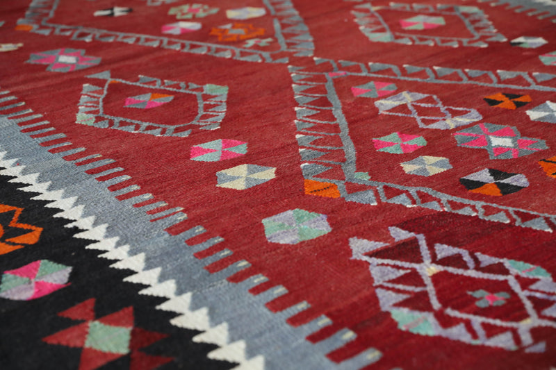 Vintage kilim rug in living room setting, bright colors, wild shaman, soft rug, bold color, Portland, Oregon, rug store, rug shop, local shop, vintage rug, modern kilim, warm colors