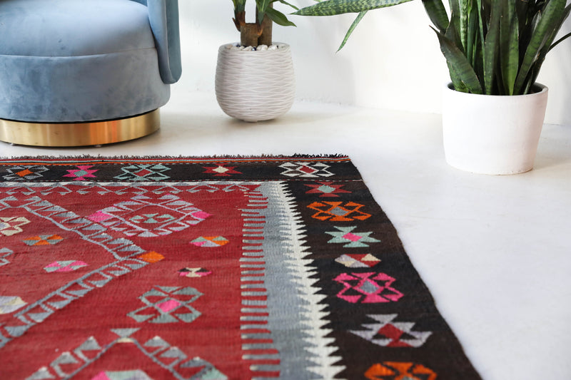 Vintage kilim rug in living room setting, bright colors, wild shaman, soft rug, bold color, Portland, Oregon, rug store, rug shop, local shop, vintage rug, modern kilim, warm colors