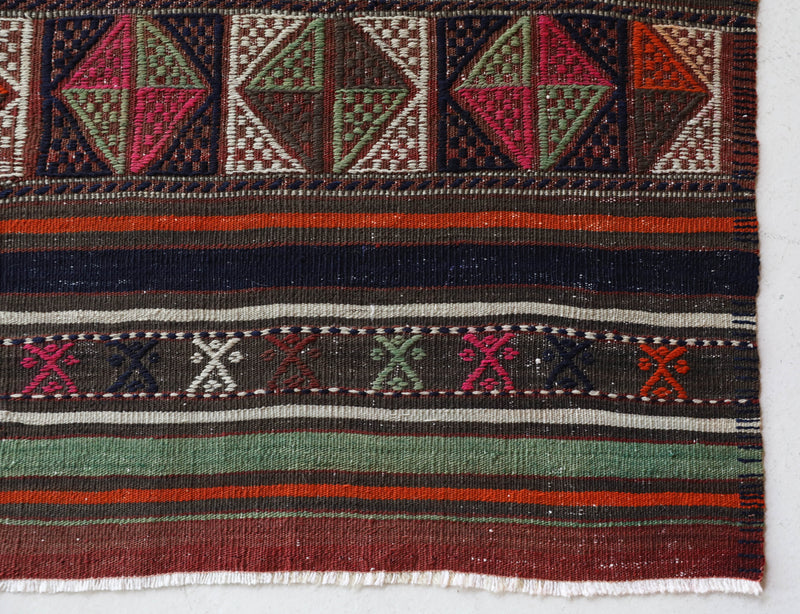 Vintage kilim rug in living room setting, bright colors, wild shaman, soft rug, bold color, Portland, Oregon, rug store, rug shop, local shop, vintage rug, modern kilim, warm colors