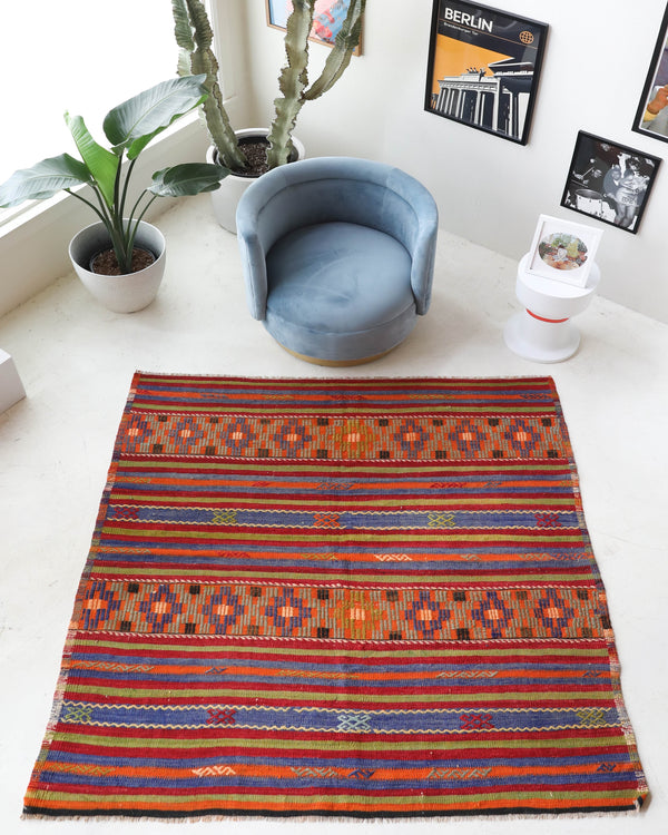 Vintage kilim rug in living room setting, bright colors, wild shaman, soft rug, bold color, Portland, Oregon, rug store, rug shop, local shop, vintage rug, modern kilim, warm colors