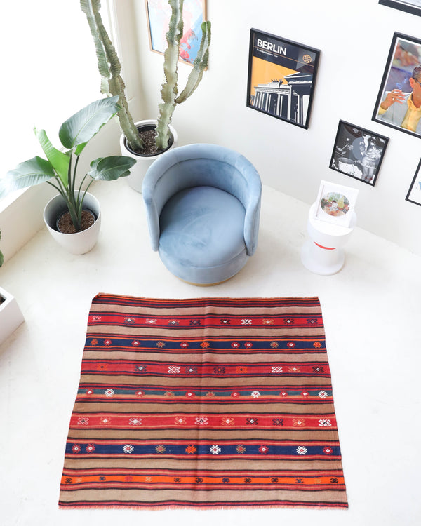 Vintage kilim rug in living room setting, bright colors, wild shaman, soft rug, bold color, Portland, Oregon, rug store, rug shop, local shop, vintage rug, modern kilim, warm colors