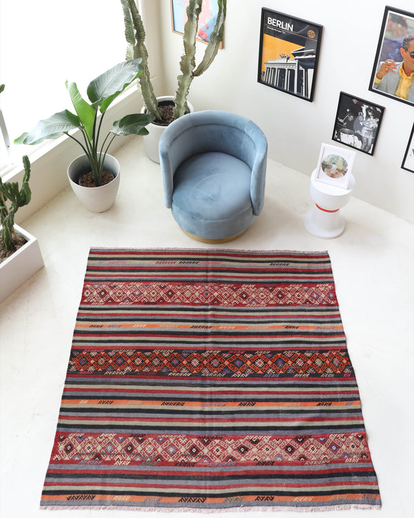 Vintage kilim rug in living room setting, bright colors, wild shaman, soft rug, bold color, Portland, Oregon, rug store, rug shop, local shop, vintage rug, modern kilim, warm colors