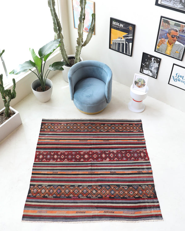 Vintage kilim rug in living room setting, bright colors, wild shaman, soft rug, bold color, Portland, Oregon, rug store, rug shop, local shop, vintage rug, modern kilim, warm colors