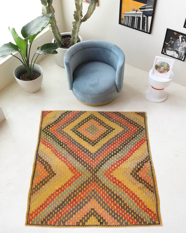 Vintage kilim rug in living room setting, bright colors, wild shaman, soft rug, bold color, Portland, Oregon, rug store, rug shop, local shop, vintage rug, modern kilim, warm colors