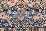 Vintage Turkish rug in a living room setting, Area rug in a living room setting, pile rug, Turkish rug, old rug, antique rug, pastel colors, faded colors, Turkish rug, vintage rug, soft rug, Portland, Oregon, rug store, rug shop, local shop, distressed rug, worn out rug
