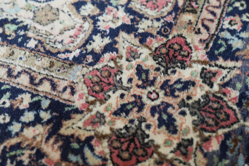 Vintage Turkish rug in a living room setting, Area rug in a living room setting, pile rug, Turkish rug, old rug, antique rug, pastel colors, faded colors, Turkish rug, vintage rug, soft rug, Portland, Oregon, rug store, rug shop, local shop, distressed rug, worn out rug