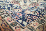 Vintage Turkish rug in a living room setting, Area rug in a living room setting, pile rug, Turkish rug, old rug, antique rug, pastel colors, faded colors, Turkish rug, vintage rug, soft rug, Portland, Oregon, rug store, rug shop, local shop, distressed rug, worn out rug