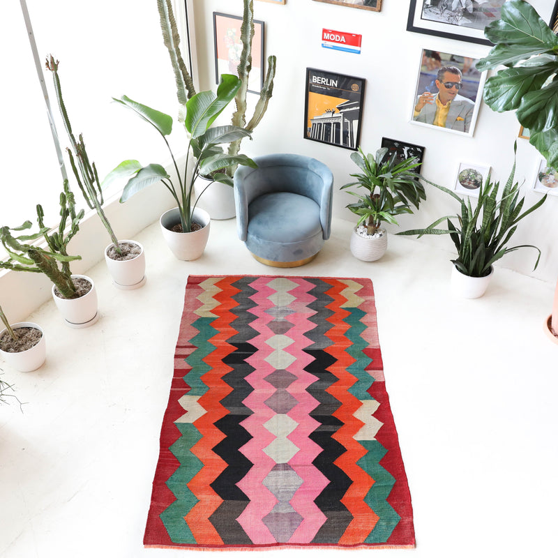 Vintage kilim rug in living room setting, bright colors, wild shaman, soft rug, bold color, Portland, Oregon, rug store, rug shop, local shop, vintage rug, modern kilim, warm colors