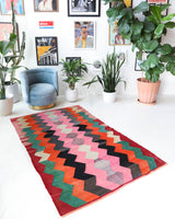 Vintage kilim rug in living room setting, bright colors, wild shaman, soft rug, bold color, Portland, Oregon, rug store, rug shop, local shop, vintage rug, modern kilim, warm colors