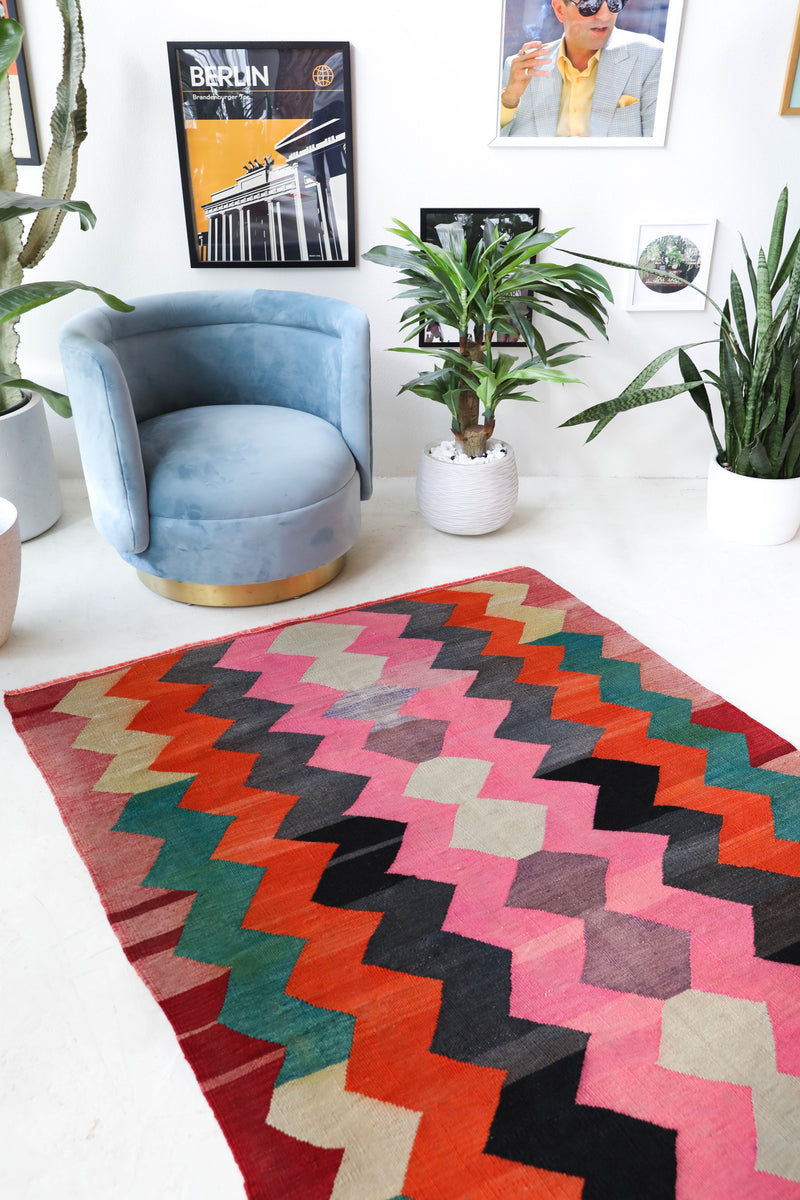 Vintage kilim rug in living room setting, bright colors, wild shaman, soft rug, bold color, Portland, Oregon, rug store, rug shop, local shop, vintage rug, modern kilim, warm colors