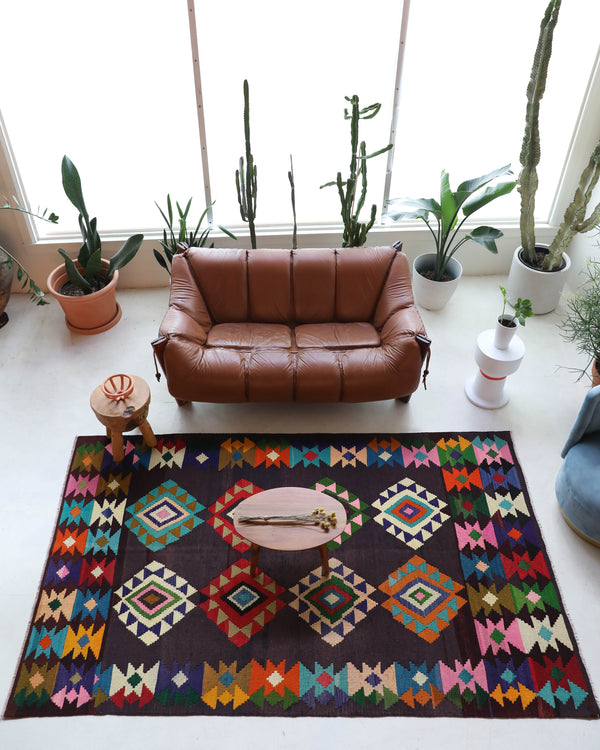 Vintage kilim rug in living room setting, bright colors, wild shaman, soft rug, bold color, Portland, Oregon, rug store, rug shop, local shop, vintage rug, modern kilim, warm colors