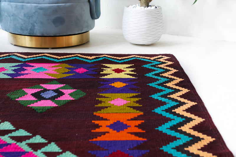 Vintage kilim rug in living room setting, bright colors, wild shaman, soft rug, bold color, Portland, Oregon, rug store, rug shop, local shop, vintage rug, modern kilim, warm colors