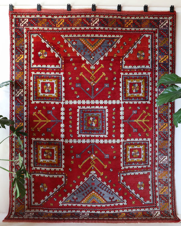 Vintage Turkish rug in a living room setting, pile rug, Turkish rug, vintage rug, portland, rug shop, bright colors, wild shaman, soft rug, bold color, Portland, Oregon, rug store, rug shop, local shop, antique rug