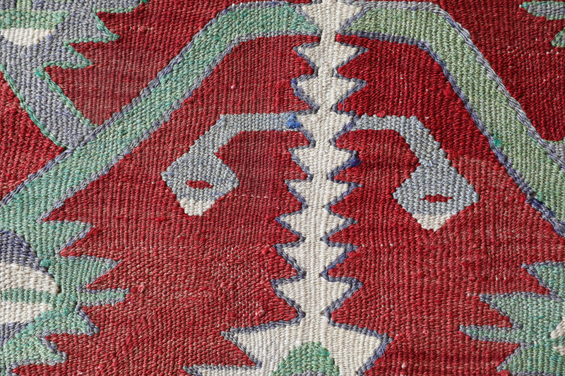  Vintage kilim rug in room decor setting, old rug, antique rug, pastel colors, faded colors, Turkish rug, vintage rug, soft rug, Portland, Oregon, rug store, rug shop, local shop, bold colors, bright colors, faded colors