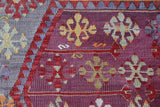 Vintage kilim rug in room decor setting, old rug, antique rug, pastel colors, faded colors, Turkish rug, vintage rug, soft rug, Portland, Oregon, rug store, rug shop, local shop,  antique kilim rug