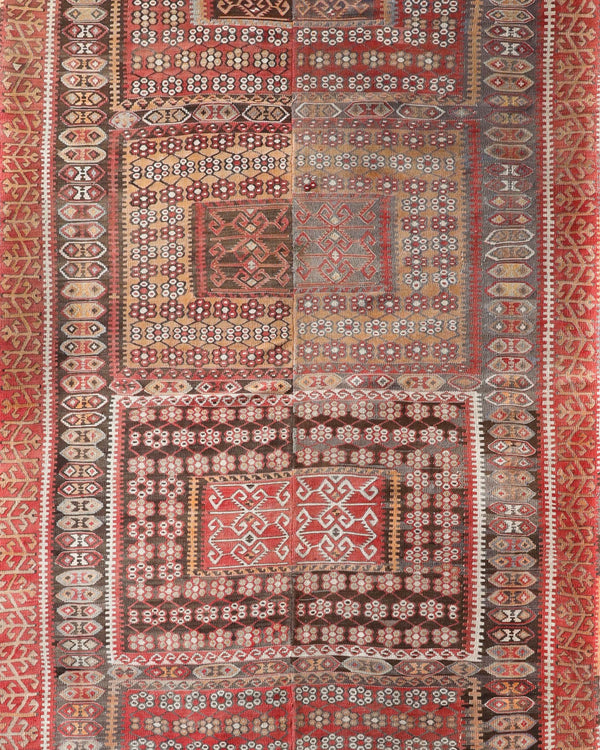 Vintage kilim rug in living room setting, old rug, antique rug, pastel colors, faded colors, Turkish rug, vintage rug, soft rug, Portland, Oregon, rug store, rug shop, local shop, earthy tones, earthy colors, warm colors