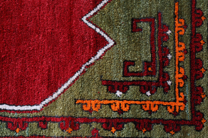 Vintage Turkish rug in a living room setting, pile rug, Turkish rug, vintage rug, portland, rug shop, bright colors, wild shaman, soft rug, bold color, Portland, Oregon, rug store, rug shop, local shop, antique rug