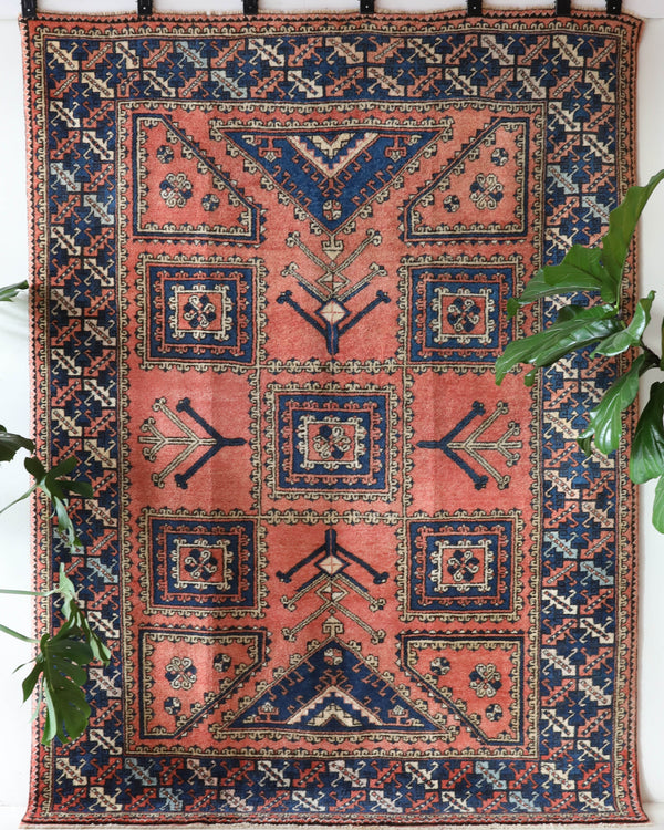 Vintage Turkish rug in living room setting, old rug, antique rug, pastel colors, faded colors, Turkish rug, vintage rug, soft rug, Portland, Oregon, rug store, rug shop, local shop