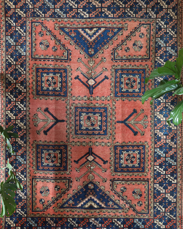 Vintage Turkish rug in living room setting, old rug, antique rug, pastel colors, faded colors, Turkish rug, vintage rug, soft rug, Portland, Oregon, rug store, rug shop, local shop