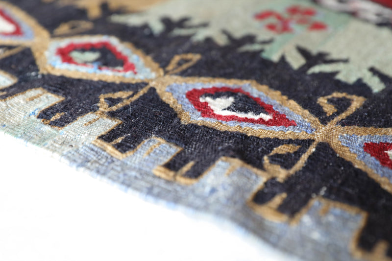  Vintage kilim rug in living room setting, bright colors, wild shaman, soft rug, bold color, Portland, Oregon, rug store, rug shop, local shop, vintage rug, modern kilim, warm colors, antique kilim rug