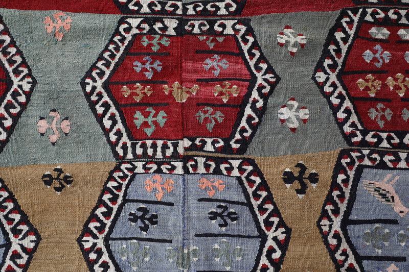  Vintage kilim rug in living room setting, bright colors, wild shaman, soft rug, bold color, Portland, Oregon, rug store, rug shop, local shop, vintage rug, modern kilim, warm colors, antique kilim rug