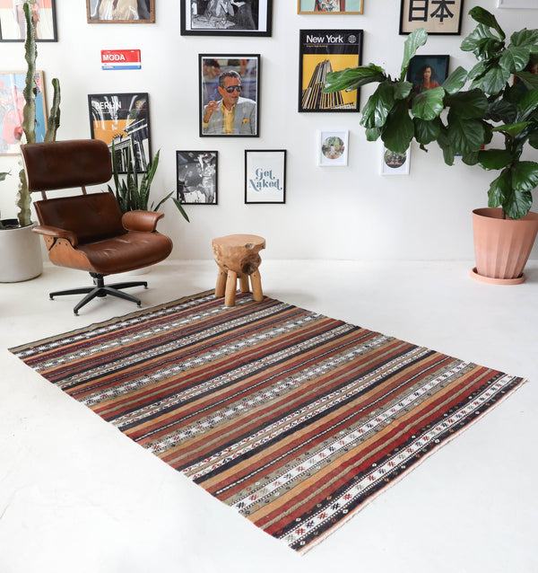 Vintage kilim rug in living room setting, bright colors, wild shaman, soft rug, bold color, Portland, Oregon, rug store, rug shop, local shop, vintage rug, modern kilim, warm colors