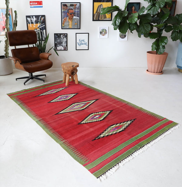 Vintage kilim rug in living room setting, bright colors, wild shaman, soft rug, bold color, Portland, Oregon, rug store, rug shop, local shop, vintage rug, modern kilim, warm colors