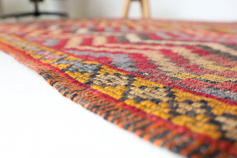 Vintage kilim rug in living room setting, bright colors, wild shaman, soft rug, bold color, Portland, Oregon, rug store, rug shop, local shop, vintage rug, modern kilim, warm colors