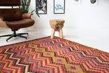 Vintage kilim rug in living room setting, bright colors, wild shaman, soft rug, bold color, Portland, Oregon, rug store, rug shop, local shop, vintage rug, modern kilim, warm colors