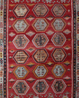 Vintage kilim rug in room decor setting, old rug, antique rug, pastel colors, faded colors, Turkish rug, vintage rug, soft rug, Portland, Oregon, rug store, rug shop, local shop, bold colors, bright colors, faded colors