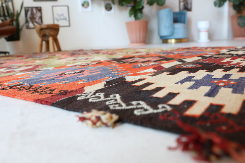 Vintage kilim rug in living room setting, bright colors, wild shaman, soft rug, bold color, Portland, Oregon, rug store, rug shop, local shop, vintage rug, modern kilim, warm colors