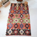 Vintage kilim rug in living room setting, bright colors, wild shaman, soft rug, bold color, Portland, Oregon, rug store, rug shop, local shop, vintage rug, modern kilim, warm colors