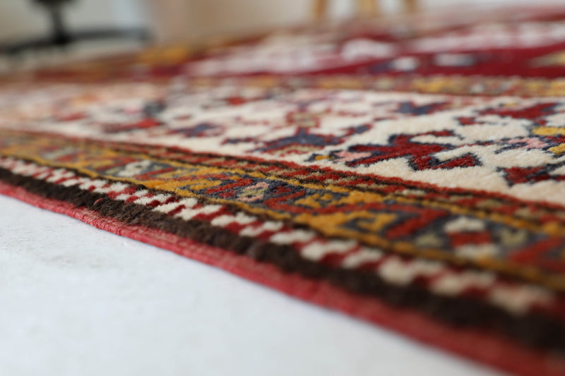 Vintage Turkish rug in a living room setting, Area rug in a living room setting, pile rug, Turkish rug, modern rug, customizable rug, portland, rug shop, bright colors, wild shaman, soft rug, bold color, Portland, Oregon, rug store, rug shop, local shop