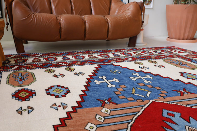 Vintage Turkish rug in a living room setting, Area rug in a living room setting, pile rug, Turkish rug, custom rug, , new rug, modern rug, customizable rug, made to order rug, portland, rug shop, bright colors, wild shaman, soft rug, bold color, Portland, Oregon, rug store, rug shop, local shop, made in Turkey